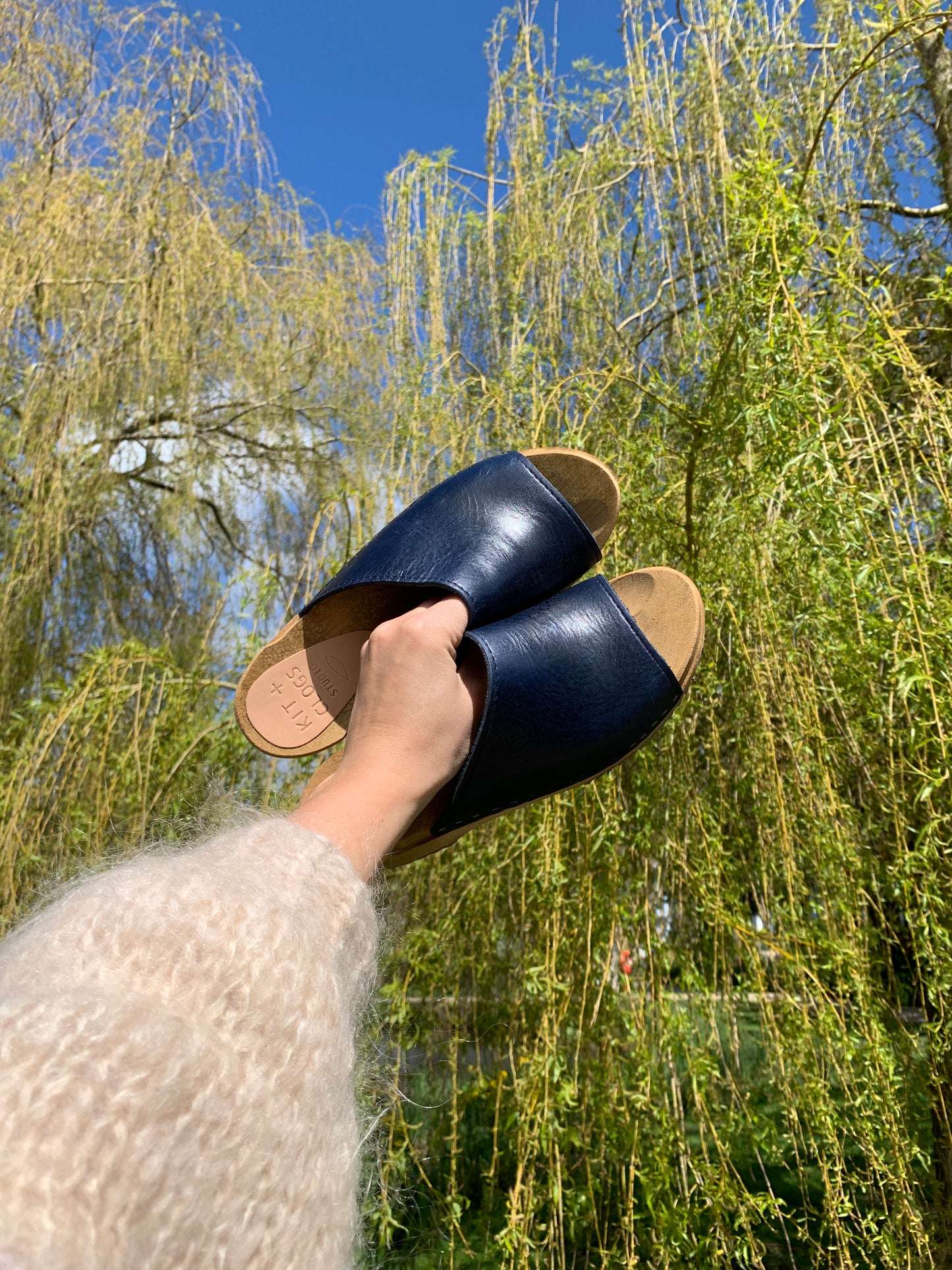 navy blue leather slip on clog sandals