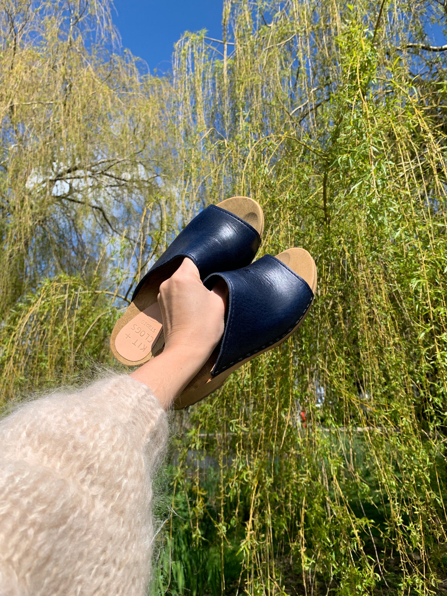 navy blue leather slip on clog sandals