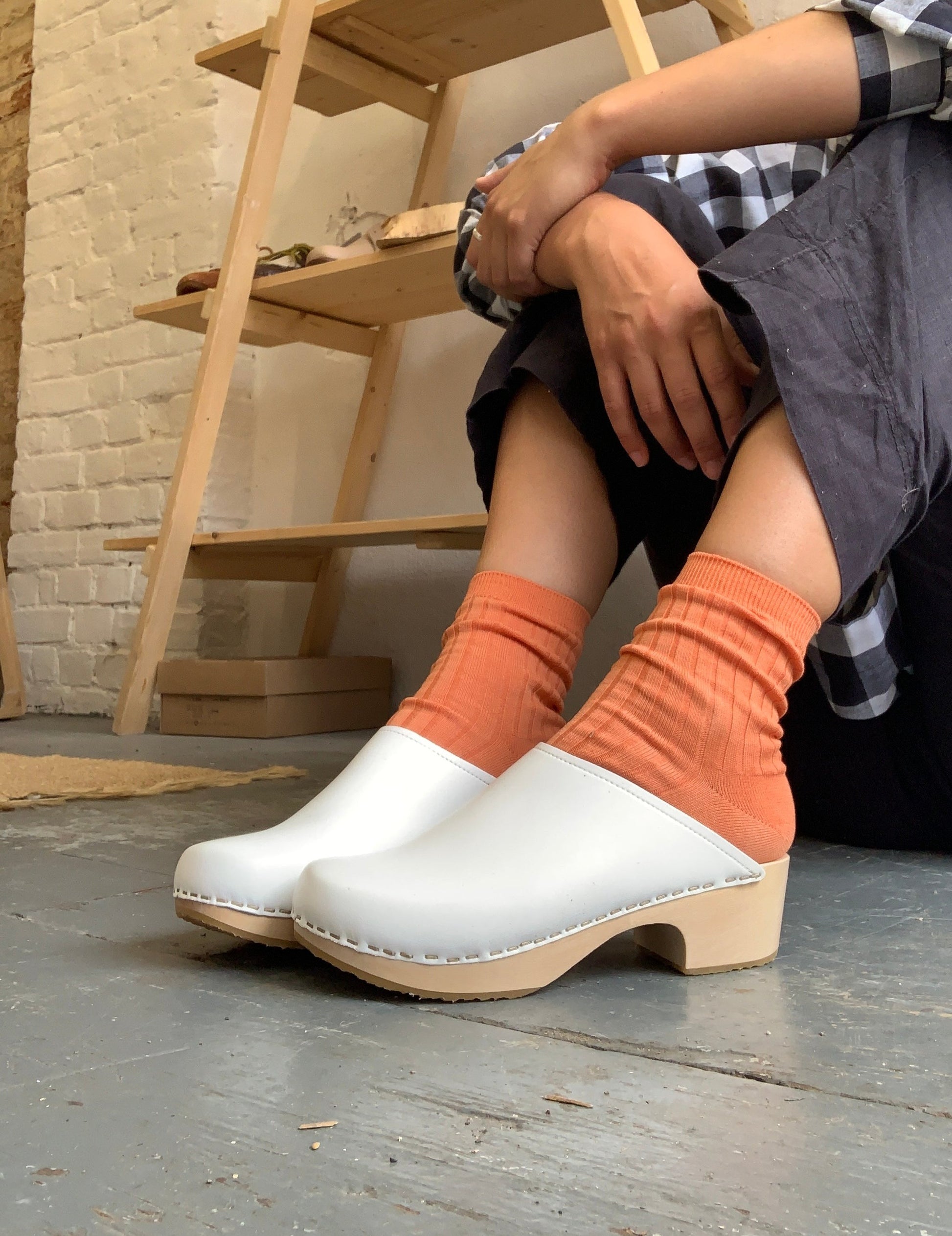 white womens swedish clog mules with a light mid heel