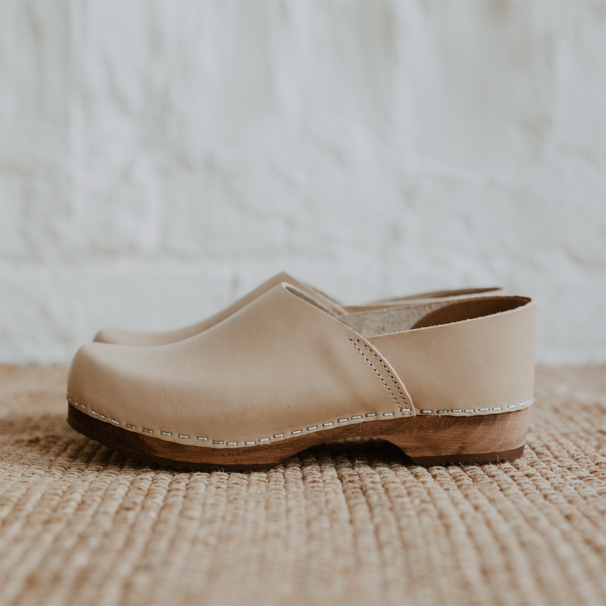 stone beige low heel clog with covered back