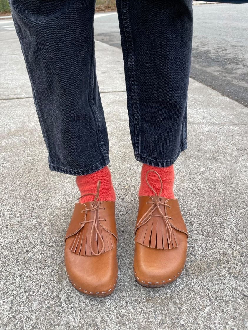 Cumin tan colour lace up mule clogs with removable fringed tongue detail anf flexible wooden base