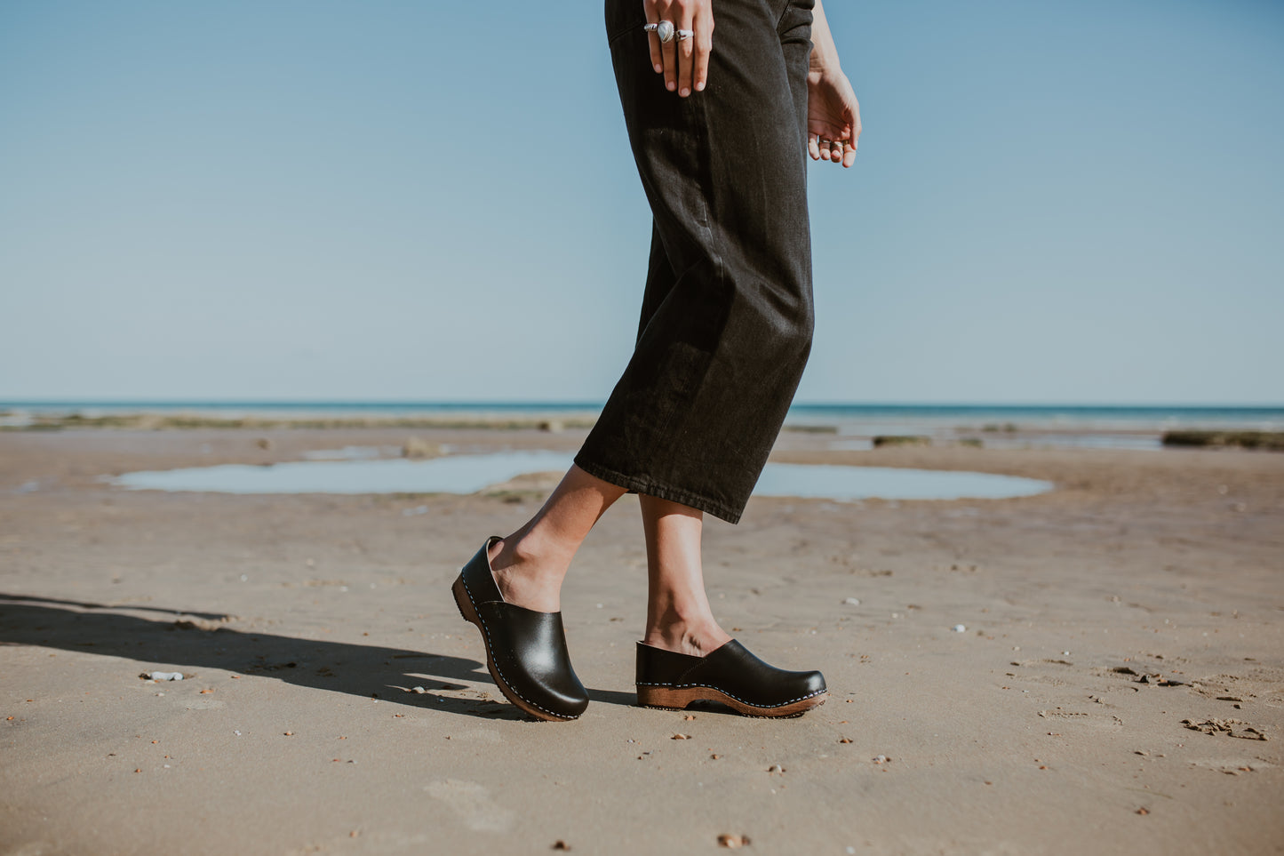 Onyx black classic style swedish clog with a covered back and a low heel