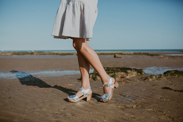 silver metallic cross over mid heel sandal clog with ankle strap