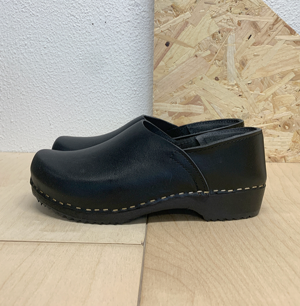 Black covered back swedish clogs with black base