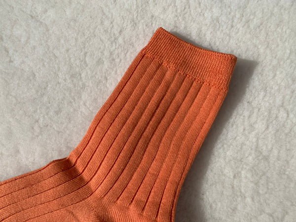 her socks in tangerine by le bon shoppe