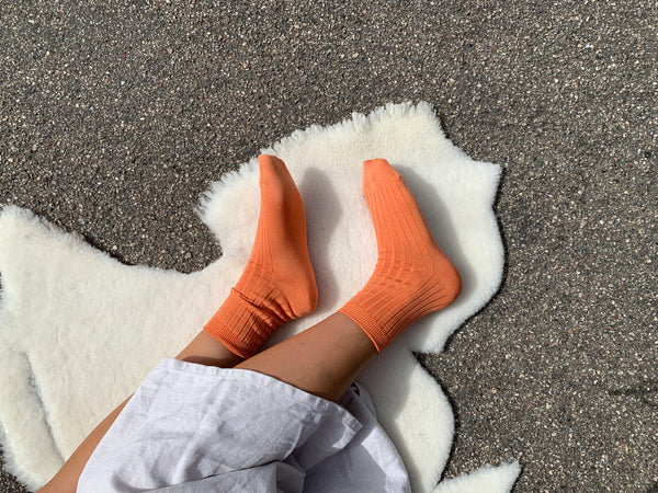 her socks in tangerine by le bon shoppe