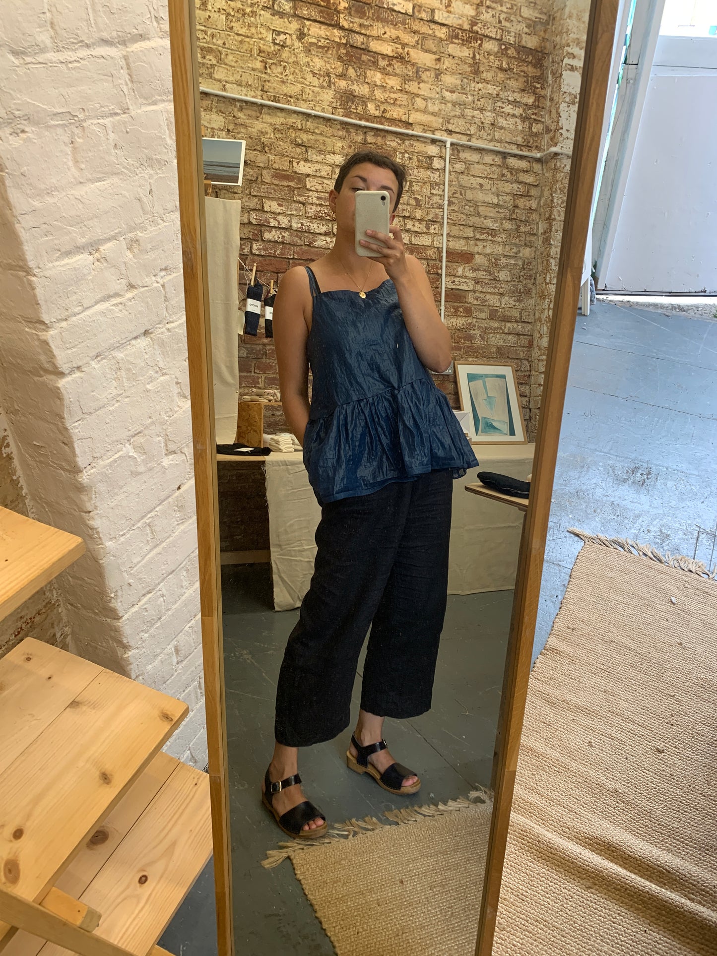 Navy blue clog sandal with ankle strap