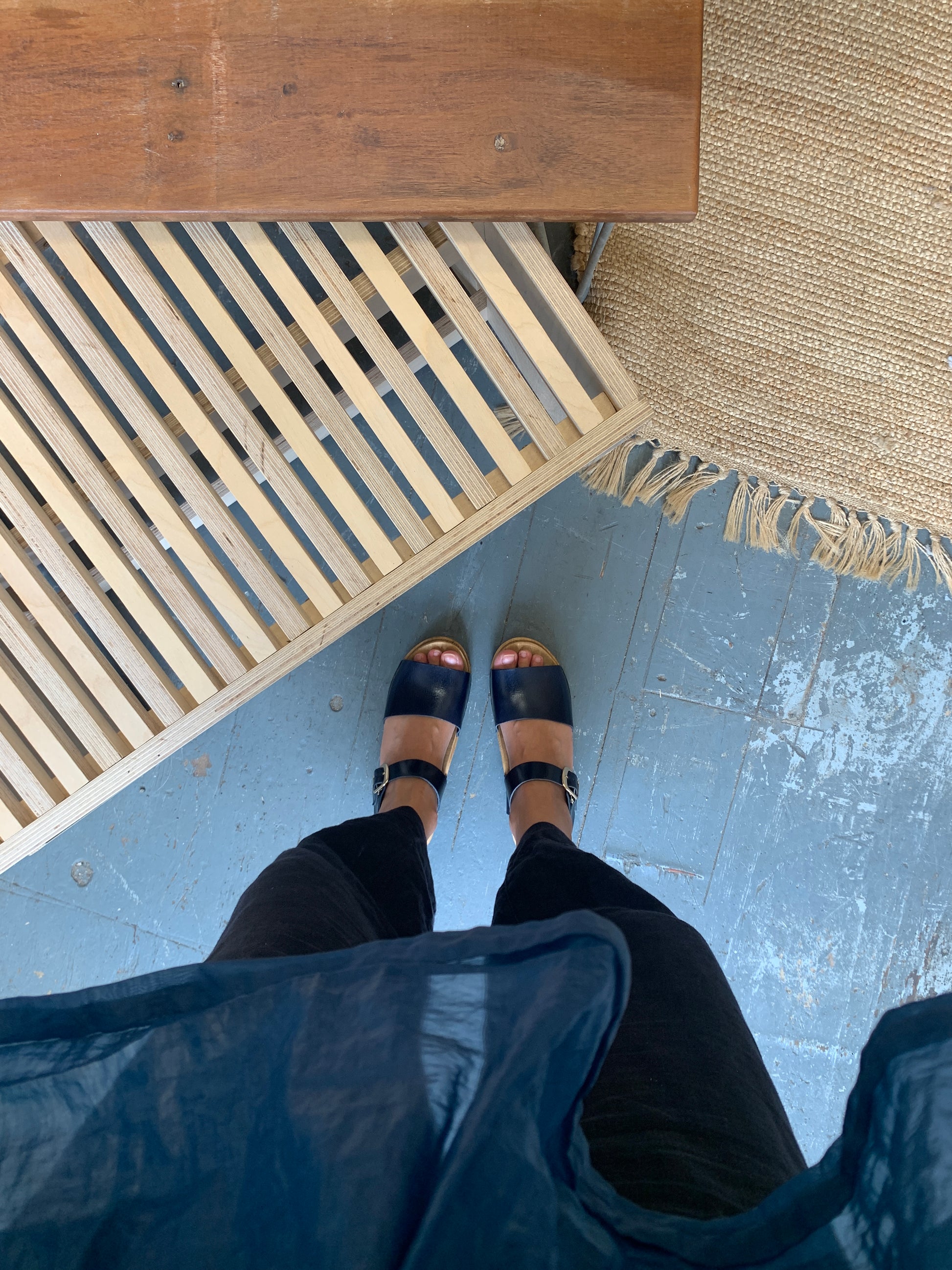 Navy blue clog sandal with ankle strap