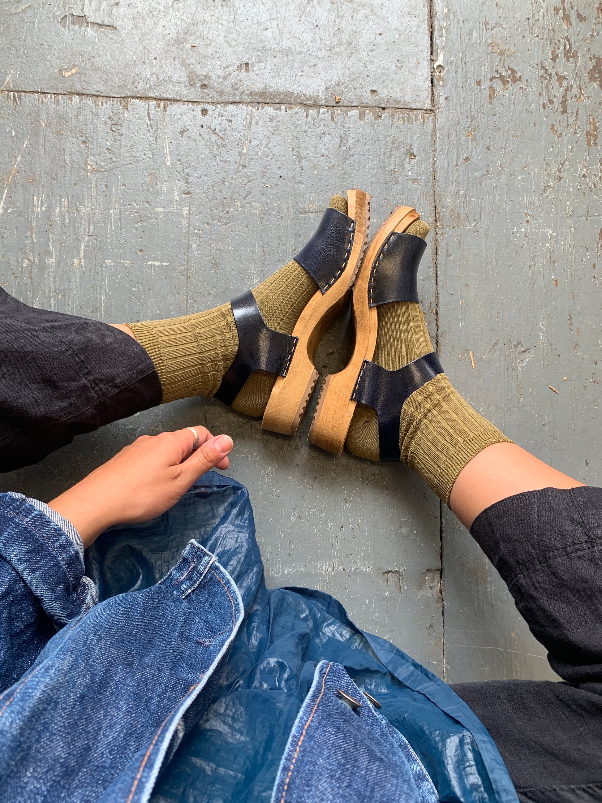 Navy blue clog sandal with ankle strap