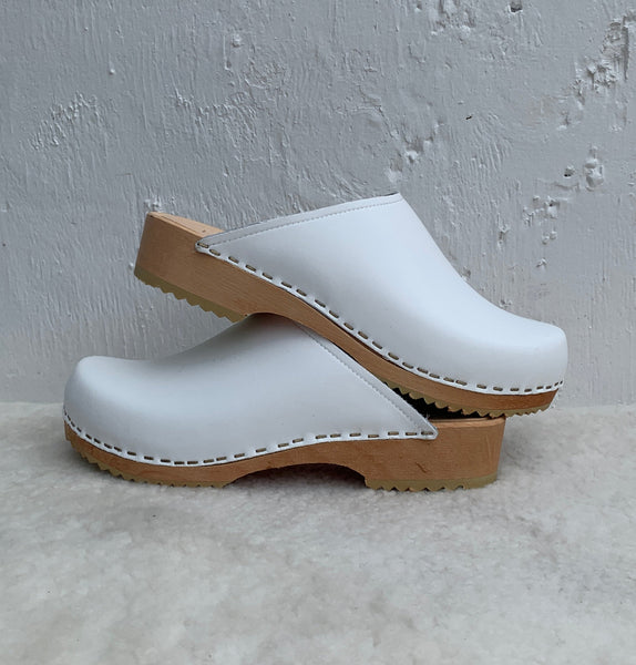 Ice white low classic style swedish clog mules with light wooden base