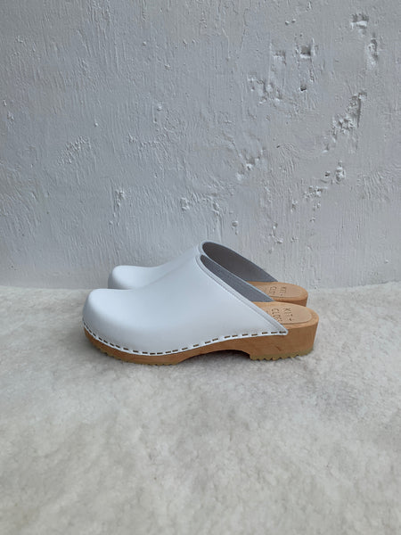 Ice white low classic style swedish clog mules with light wooden base