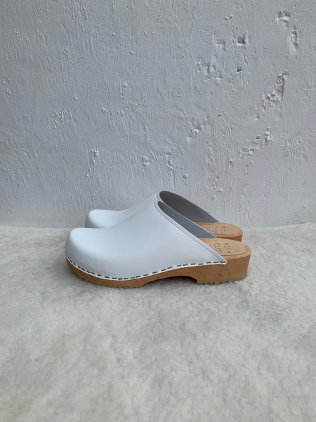 Ice white low classic style swedish clog mules with light wooden base