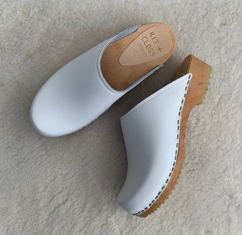 Ice white low classic style swedish clog mules with light wooden base