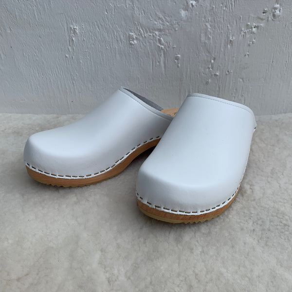 Ice white low classic style swedish clog mules with light wooden base