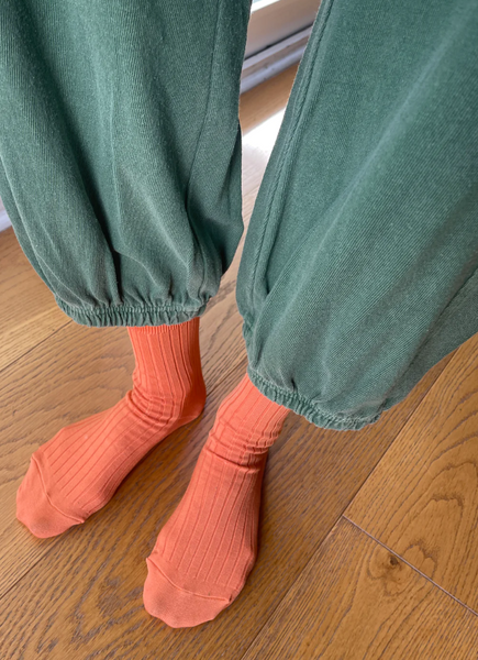 her socks in tangerine by le bon shoppe