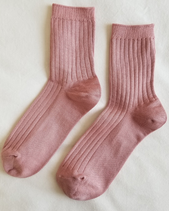 Her Socks in Desert Rose