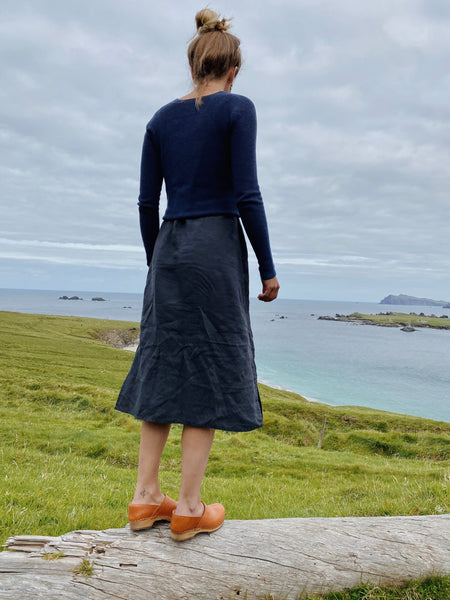 Cumin tan swedish clogs with a low wooden base and covered back