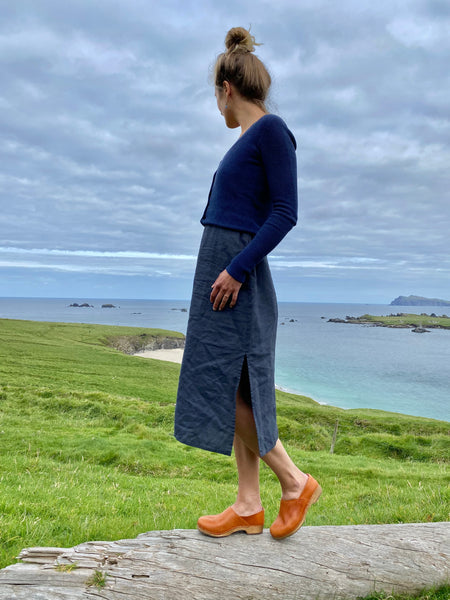 Cumin tan swedish clogs with a low wooden base and covered back