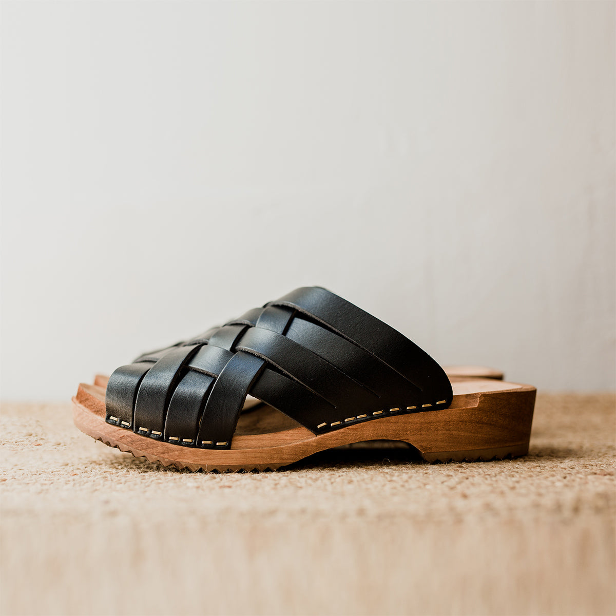 black woven clog sandal