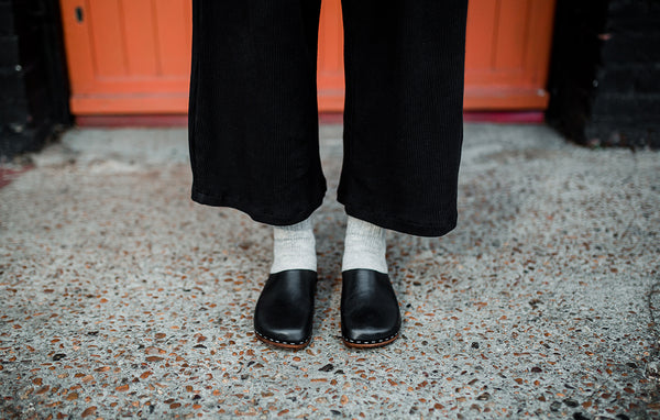 Black classic style swedish clog mule with flexible wooden base