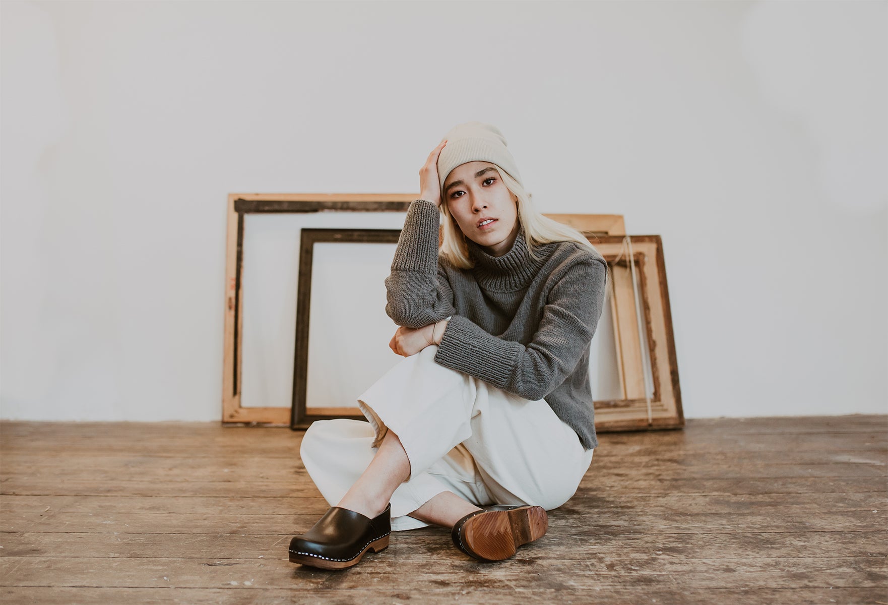 Girl wears winter wear with onyx low heel clog shoe