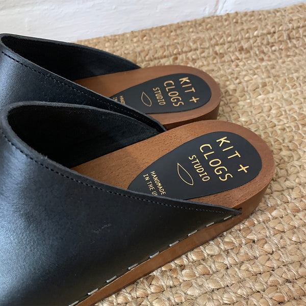 Black classic style swedish clog mule with flexible wooden base